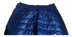 Pantalón Nike Largo Qld Strack de color azul, diseñado para fútbol profesional, con un acabado acolchado en la parte frontal.