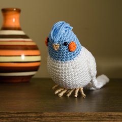 Calopsita azul em amigurumi na internet