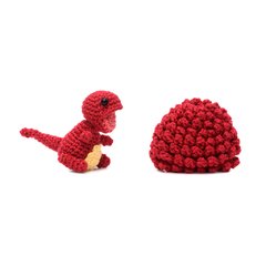 Ovo com filhote de dinossauro vermelho em amigurumi