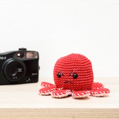 Polvo do humor rosa em amigurumi na internet