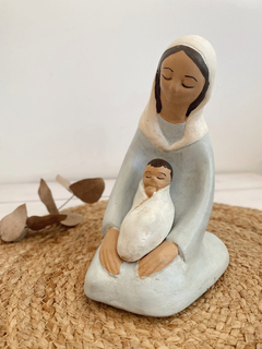 Imagen virgen con niño regazo celeste (NO SE ENVIA POR CORREO ARGENTINO)