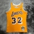 Camiseta Los Angeles Lakers Magic Johnson 1984/85 Swingman - M&N Hardwood Classics - Amarelo