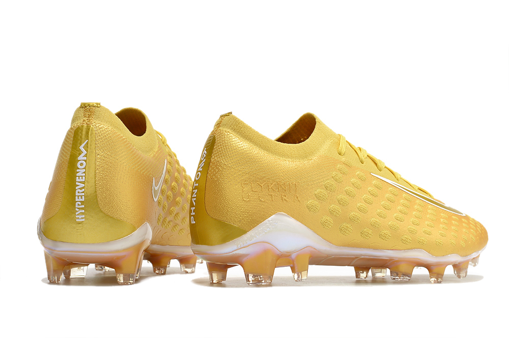 Chuteira nike phantom deals dourada
