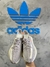 Adidas Yeezy Cinza/ Laranja na internet