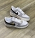 Nike Air Force One Branco/ Cinza/ Preto na internet