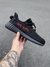 Adidas Yeezy Preto/ Vermelho na internet