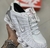 Nike 12 Molas Branco/ Prata - comprar online
