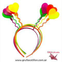 VINCHA PLASTICA FLUO CORAZON x4