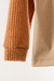 Sweater Agostina con recortes en cuero en internet