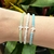 Pulseira de cristal com cruz