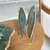 Borboleta verde com base em pedestal - loja online
