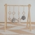 Imagen de Estación gimnasio de madera Montessori con juegos soft colgantes