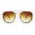O Óculos de Sol Hexagonal 2.0 Tartaruga possui a parte frontal em acetato estampado, lentes na cor marrom degradê e armação em metal na cor dourada, com ponteiras em acetato na cor preta.
