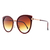 O Óculos de Sol Luana Marrom possui um design em formato gatinho, armação em acetato marrom e detalhes de metal banho rose. Lente degrade na cor marrom. 