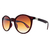 O Óculos de Sol Trindade Marrom Degradê possui um design arrojado e esportivo, em formato redondo, armação de acetato na cor marrom com detalhes vermelhos na ponteira e parte frontal. Lentes degradê marrom.