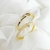 Imagem do Bracelete rígido com fecho de encaixe em formato de prego com pedras de zircônias cor cristal Banhado em ouro 18k