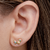 Brinco Ear Cuff 3 corações cravejados com zircônias coloridas Banhado em Ouro 18k - comprar online