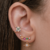 Brinco Ear Cuff com pedras de zircônias coloridas e pingente estrela de 8 pontas cravejado com pedra zircônia cristal Banhado em ouro 18k - comprar online