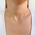 Colar Choker Fina com Flor Madrepérola Banhado em Ouro 18k