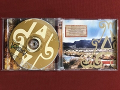 CD Duplo - América - Nacional & Internacional - Seminovo - Sebo Mosaico - Livros, DVD's, CD's, LP's, Gibis e HQ's