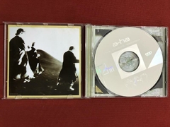 CD - A-Ha - The Singles - 1984/2004 - Nacional - Seminovo na internet
