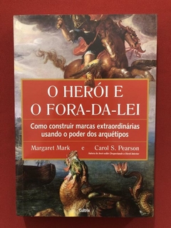 Livro - O Herói E O Fora-Da-Lei - Margaret Mark - Seminovo