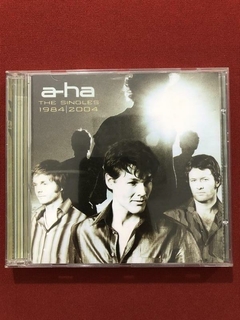 CD - A-Ha - The Singles - 1984/2004 - Nacional - Seminovo