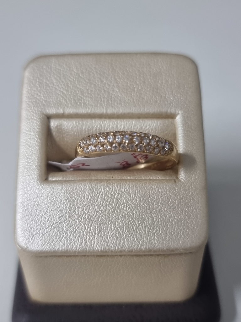 Anillo oro 18klts medio sin fin con cubic peso 2 gramos