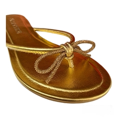 RASTEIRA CHINELO DOURADO LAÇO BRILHO MAITHE 95240 na internet