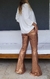 Pantalon metalizado ocre. en internet