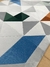 Imagem do Tapete Optik | Fundo Granito, detalhes em Terracota, Verde e Azul Petróleo