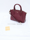 Bolsa Michael Kors Wine Leather Crossbody na internet