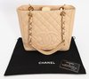 Bolsa Chanel Beige Quilted Caviar Leather Petite Shopping Tote - loja online