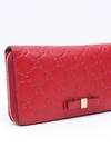 Carteira Gucci Red Guccissima Bow Zip Around na internet