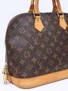 Bolsa Louis Vuitton Monogram Alma MM na internet