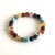 Pulseira dos 7 Chakras com Detalhe Redondo OM - comprar online