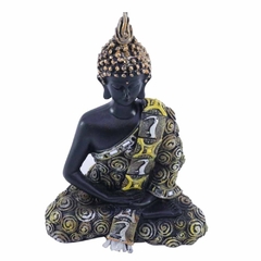 Buda meditando em resina com detalhes em dourado