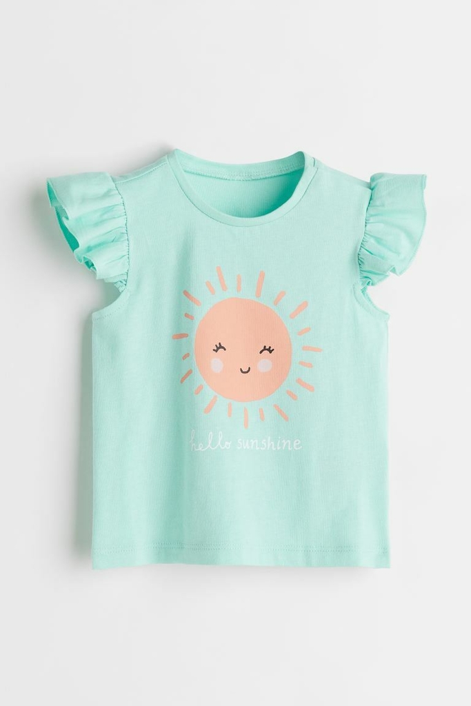 Remera nena H M celeste sol talles 2 a 4 anos
