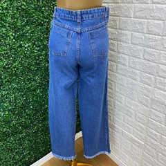 Calça jeans com abertura nas laterais TAM: 38 na internet