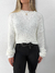 Tricot cropped neve na internet