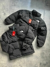 Puffer total black 700 TNF