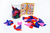 7 TANGRAMS - Tarro con 7 tangrams entero para mezclar las piezas y armar nuevas figuras - Playstick