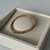 Bracelete Oval Pontilhado Dourado na internet