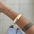 Bracelete Oval Martelado Dourado - comprar online