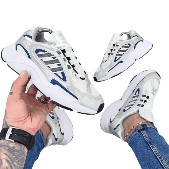 Comprar Tenis Adidas Ozmillen Adiplus Mujer.Los Tenis Adidas Ozmillen Adiplus Mujer son el complemento perfecto para quienes buscan estilo, comodidad y rendimiento. Diseñados para ofrecer una experiencia superior, estos tenis destacan por su calidad y diseño innovador. En Onlineshoppingcenterg te ofrecemos las mejores opciones para adquirirlos al mejor precio.¿Por qué comprar los Adidas Ozmillen Adiplus Mujer?Adidas ha creado los Ozmillen Adiplus con tecnologías avanzadas que se adaptan a las necesidades de las mujeres modernas. Estos tenis no solo destacan por su estética vanguardista, sino también por su rendimiento incomparable.Ventajas de los Adidas Ozmillen Adiplus MujerComodidad excepcional: Gracias a su tecnología Adiplus, ofrecen un soporte único para el pie.Diseño moderno: Disponibles en colores como negro, blanco y combinaciones vibrantes, ideales para cualquier outfit.Durabilidad garantizada: Fabricados con materiales de alta calidad que resisten el uso diario.Versatilidad: Perfectos para entrenamientos, caminatas o uso casual.Características principalesDiseño ergonómicoLos Tenis Adidas Ozmillen Mujer están diseñados pensando en la anatomía femenina, garantizando un ajuste perfecto y comodidad durante todo el día.Materiales de alta calidadElaborados con materiales resistentes y ligeros, aseguran una larga duración sin comprometer el estilo.Tecnología AdiplusProporciona amortiguación avanzada para minimizar el impacto y mejorar el rendimiento en cada paso.¿Dónde comprar los Adidas Ozmillen Adiplus Mujer?En Onlineshoppingcenterg te ofrecemos la mejor selección de Adidas Ozmillen. Aquí encontrarás modelos exclusivos y una experiencia de compra cómoda y segura. Además, contamos con envíos rápidos a toda Colombia.Colores disponiblesAdidas Ozmillen Negras: Perfectas para un look clásico y elegante.Adidas Ozmillen Blancas: Ideales para combinaciones frescas y modernas.Adidas Ozmillen Colombia: Diseños exclusivos para destacar.TallasDisponibles en todas las tallas para garantizar un ajuste perfecto.¿Cómo combinar tus Adidas Ozmillen Adiplus?Outfit casualCombina los Adidas Ozmillen blancos con unos jeans ajustados y una camiseta básica para un look relajado.Look deportivoPara un estilo activo, los Adidas Ozmillen negras son ideales con leggings y una chaqueta deportiva.Preguntas frecuentes¿Son garantizados los tenis que venden en Onlineshoppingcenterg?Sí, todos nuestros productos son 100% garantizados.¿Cómo hago mi compra?Solo debes seleccionar tu modelo favorito, elegir la talla y realizar el pago a través de nuestra plataforma segura.¿Hacen envíos internacionales?Por ahora, nuestros envíos son solo dentro de Colombia.Aprovecha las mejores ofertasEn Onlineshoppingcenterg siempre tenemos descuentos y promociones para que puedas comprar Tenis Adidas Ozmillen Adiplus Mujer al mejor precio. ¡No te lo pierdas!Modelos popularesAdidas Ozmillen Hombre: Diseños exclusivos para él.Adidas Ozmillen Mujer: Estilo y comodidad para ellas.Adidas Ozmillen Vintage: Un clásico reinventado.No esperes más y adquiere tus Tenis Adidas Ozmillen Adiplus Mujer hoy mismo en nuestra tienda. ¡Descubre la diferencia de calidad y estilo con Adidas!