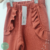 Pantalón con Frisa Volados Terracota - comprar online