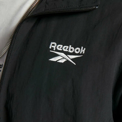 ROMPEVIENTO UNISEX REEBOK VECTOR TRACKTOP 2507 NEGRO en internet