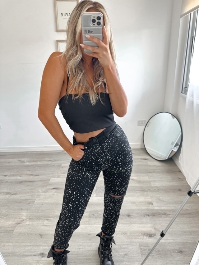 Pantalon negro con brillos sale