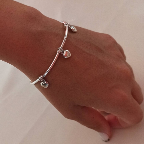 Pulsera con dijes corazónes-Plata925