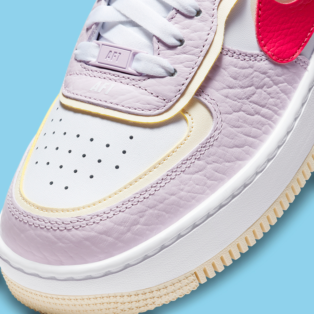 Nike sales pink yellow